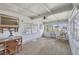 Sunroom with ample natural light and comfortable seating at 718 50Th Avenue W Dr, Bradenton, FL 34207