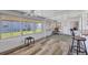 Sunroom with a view of backyard, offering plenty of natural light at 718 50Th Avenue W Dr, Bradenton, FL 34207