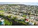 Home on a canal with an open ocean view, palm trees, and easy access to boating at 21288 Edgewater Dr, Port Charlotte, FL 33952