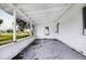 Covered back porch perfect for relaxing or entertaining guests at 21288 Edgewater Dr, Port Charlotte, FL 33952