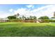 Expansive backyard overlooking a scenic canal, providing tranquility and outdoor enjoyment at 21288 Edgewater Dr, Port Charlotte, FL 33952