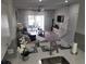 Open-concept living space with sliding glass doors to a patio, visible from the kitchen counter at 4629 Sabal Key Dr # 4629, Bradenton, FL 34203