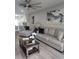 Comfortable living room featuring a neutral color palette, contemporary artwork, and modern furnishings at 4629 Sabal Key Dr # 4629, Bradenton, FL 34203