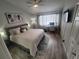 Serene main bedroom with a plush bed, dedicated office space, and ample natural light at 4629 Sabal Key Dr # 4629, Bradenton, FL 34203