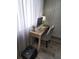 Cozy office space with wooden desk, modern computer setup, and natural light at 4629 Sabal Key Dr # 4629, Bradenton, FL 34203
