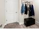 Entryway with coat hooks and storage bench at 12015 Goldenrod Ave, Bradenton, FL 34212