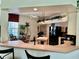 Spacious kitchen with island and breakfast bar at 5658 Downham Meadows, Sarasota, FL 34235
