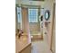 Clean bathroom with tub, shower, and updated vanity at 5658 Downham Meadows, Sarasota, FL 34235