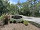 The Meadows Country Club entrance sign and landscaping at 5658 Downham Meadows, Sarasota, FL 34235
