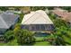 Aerial view of the property showcasing its backyard oasis at 14717 Leopard Creek Pl, Lakewood Ranch, FL 34202