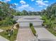 Aerial view of home showcasing the backyard, lake, and community at 3778 Bonaventure Ct, Sarasota, FL 34243