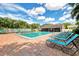 Refreshing community pool with plenty of lounge chairs at 5400 26Th W St # C45, Bradenton, FL 34207