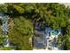 Aerial view showcasing house, pool, and lush surroundings at 1922 Field Rd, Sarasota, FL 34231