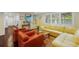 Bright living room featuring a large sectional sofa and comfortable armchairs at 1922 Field Rd, Sarasota, FL 34231