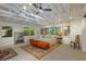 Bright bedroom with high ceilings and exposed beams at 1922 Field Rd, Sarasota, FL 34231