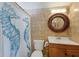 Bright bathroom with updated vanity and fixtures at 1922 Field Rd, Sarasota, FL 34231