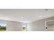Spacious bedroom with two windows and neutral decor at 4322 Silo Port Ct, Lakewood Ranch, FL 34211