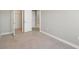 Bright bedroom with carpet flooring and access to closet and hallway at 4322 Silo Port Ct, Lakewood Ranch, FL 34211