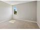 Simple bedroom with carpeted floor and window with a view at 4322 Silo Port Ct, Lakewood Ranch, FL 34211