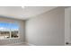 Well-lit bedroom with a large window and neutral decor at 4322 Silo Port Ct, Lakewood Ranch, FL 34211