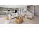 Open living room with a neutral color palette and plenty of natural light at 4322 Silo Port Ct, Lakewood Ranch, FL 34211
