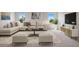 Spacious Gathering room with comfortable seating and large windows at 4322 Silo Port Ct, Lakewood Ranch, FL 34211