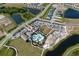 Aerial view of community pool, clubhouse, and surrounding homes at 4322 Silo Port Ct, Lakewood Ranch, FL 34211