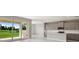 Modern kitchen with gray cabinets, an island, and sliding glass doors to the patio at 4322 Silo Port Ct, Lakewood Ranch, FL 34211