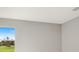 Bright bedroom with window and neutral wall colors at 4322 Silo Port Ct, Lakewood Ranch, FL 34211