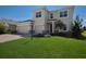Two-story house with a two-car garage and paver driveway at 4322 Silo Port Ct, Lakewood Ranch, FL 34211