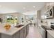 Modern kitchen with stainless steel appliances and an island at 4322 Silo Port Ct, Lakewood Ranch, FL 34211