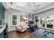 Home gym with exercise bike and built-in workspace at 501 Harbor Point Rd, Longboat Key, FL 34228