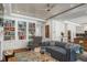 Cozy living room features built-in shelving, fireplace, and hardwood floors at 501 Harbor Point Rd, Longboat Key, FL 34228