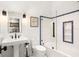 Modern bathroom with soaking tub and glass enclosure at 501 Harbor Point Rd, Longboat Key, FL 34228