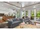 Relaxing living area with comfortable seating and access to outdoor patio at 501 Harbor Point Rd, Longboat Key, FL 34228