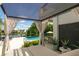 Relaxing cabana by the pool with water views at 501 Harbor Point Rd, Longboat Key, FL 34228