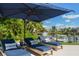 Relaxing poolside lounge area with comfortable seating at 501 Harbor Point Rd, Longboat Key, FL 34228