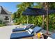 Tranquil hot tub area with comfortable loungers at 501 Harbor Point Rd, Longboat Key, FL 34228