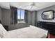 Bright bedroom with city view, built-in shelving and hardwood floors at 800 N Tamiami Trl # 1412, Sarasota, FL 34236