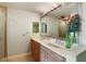Double vanity bathroom with a walk-in shower at 800 N Tamiami Trl # 1412, Sarasota, FL 34236
