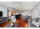 Open living room with hardwood floors, and modern furniture at 800 N Tamiami Trl # 1412, Sarasota, FL 34236