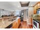 Modern kitchen with granite countertops and stainless steel appliances at 800 N Tamiami Trl # 1412, Sarasota, FL 34236