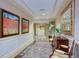 Elegant hallway with artwork and comfortable seating at 800 N Tamiami Trl # 1412, Sarasota, FL 34236