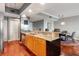 Modern kitchen with granite countertops and stainless steel appliances at 800 N Tamiami Trl # 1412, Sarasota, FL 34236