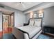 Bright bedroom with hardwood floors and modern furniture at 800 N Tamiami Trl # 1412, Sarasota, FL 34236