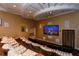 Private theater room with comfortable seating and a large screen at 800 N Tamiami Trl # 1412, Sarasota, FL 34236