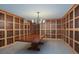 Large wine cellar with ample storage and a long table at 800 N Tamiami Trl # 1412, Sarasota, FL 34236
