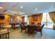 Game Room with a pool table, card table and comfortable seating at 800 N Tamiami Trl # 1412, Sarasota, FL 34236