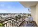 Spacious balcony with city views and small table and chairs at 800 N Tamiami Trl # 1412, Sarasota, FL 34236