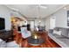 Open living room with hardwood floors, and modern furniture at 800 N Tamiami Trl # 1412, Sarasota, FL 34236